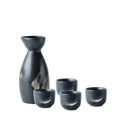 Black ceramic sake liquor dispenser set with textured speckled finish and gold brushstroke decorbites ceramic sake