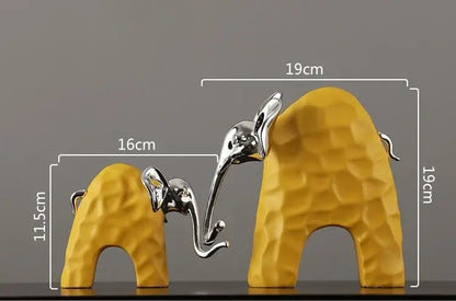Yellow and silver decorbites elephant mother-calf golden resin sculpture with textured geometric surfaces for living room decor