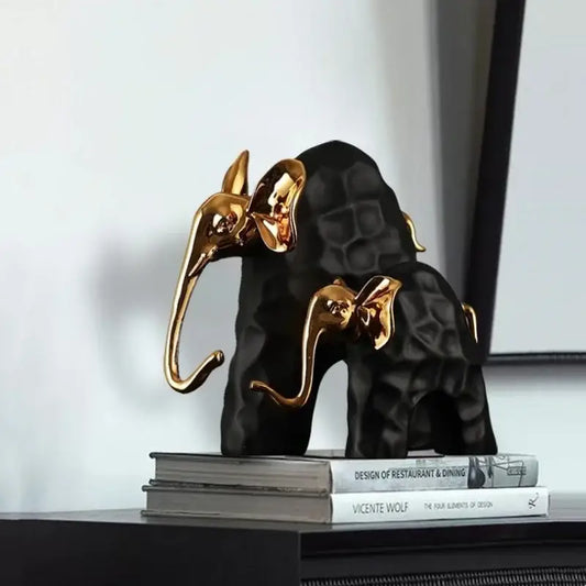 Black and gold decorbites elephant mother-calf golden resin sculpture with textured body for living room decor