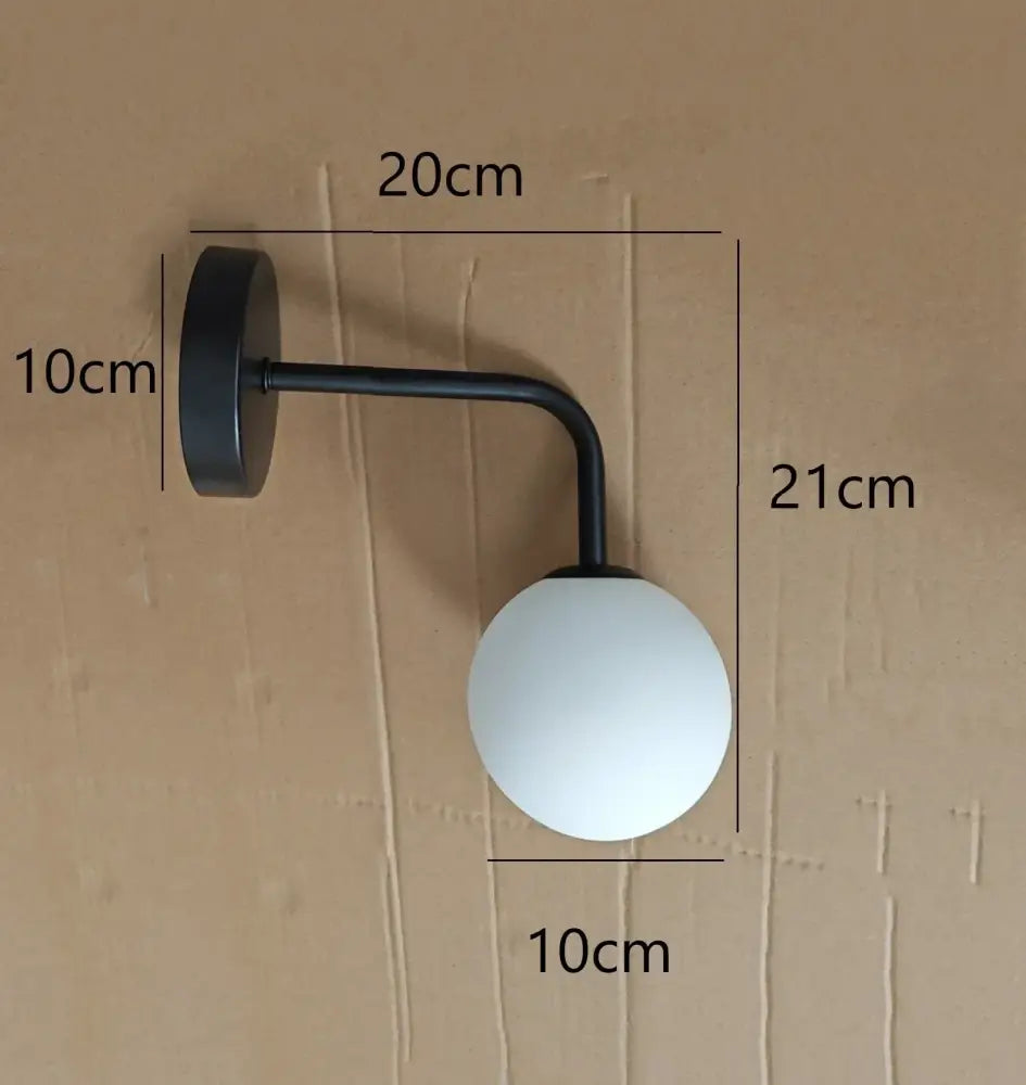 Black metal wall lamp with frosted white spherical shade decorbites golden glass led bedroom sconce lighting fixture