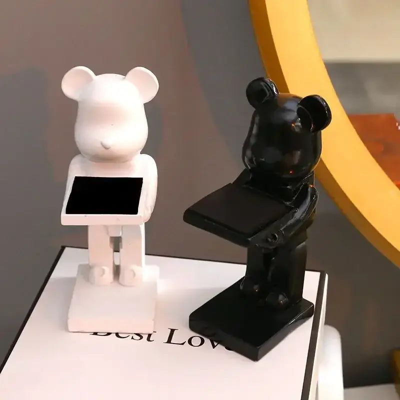 White and black glossy cartoon bear watch stands holding tablet-like holders for bedroom decor use