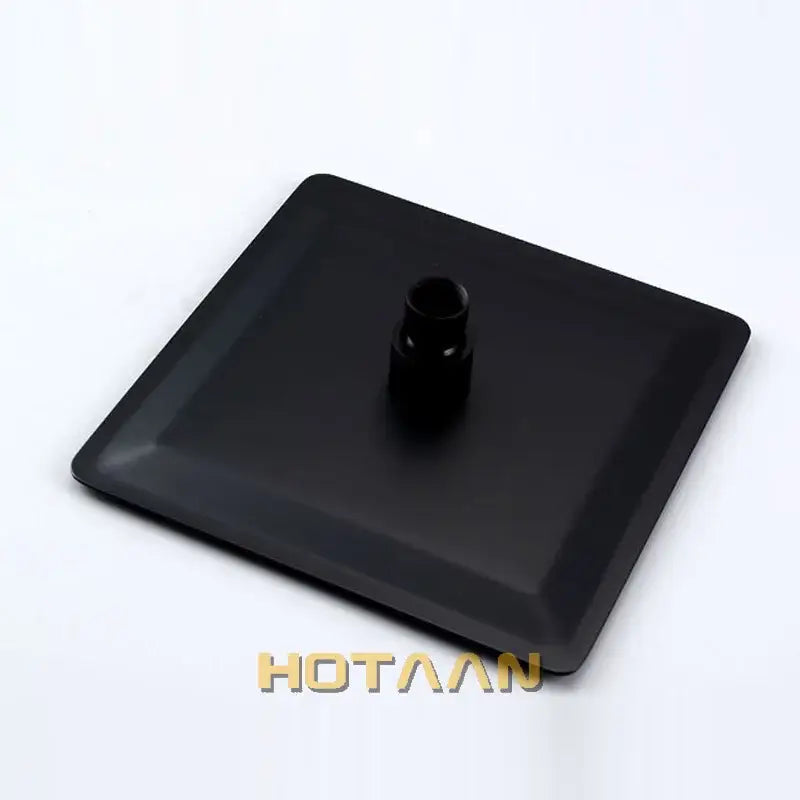 Black and silver stainless steel square shower head base with central cylindrical attachment decorbites black plated
