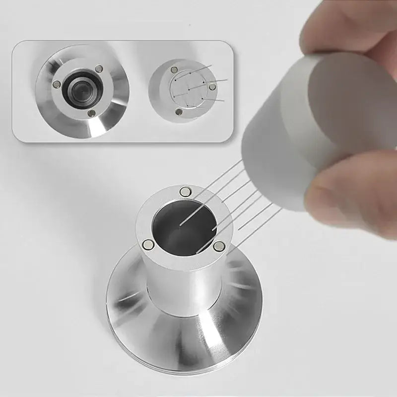 Silver metallic doorbell camera with circular lens featured alongside black and stainless steel decorbites coffee distributor tamper set