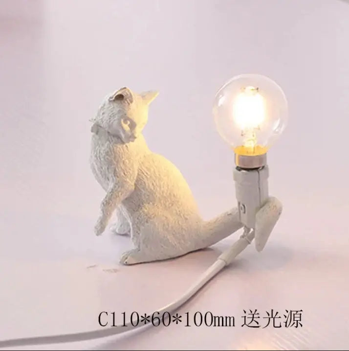 White ceramic cat resin table lamp with glowing bulb on back for bedroom decorbites cat resin decorbites cat resin table lamp