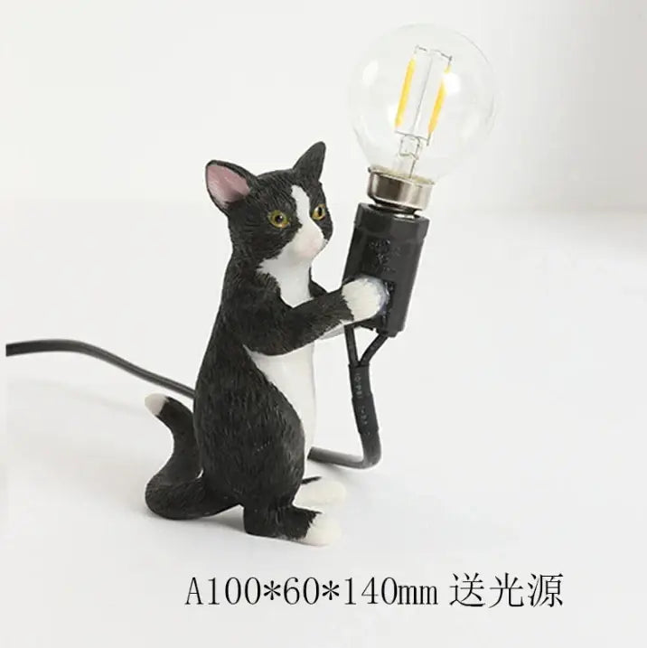 Black and white cat resin table lamp holding clear bulb with filament for bedroom decorbites cat resin decor