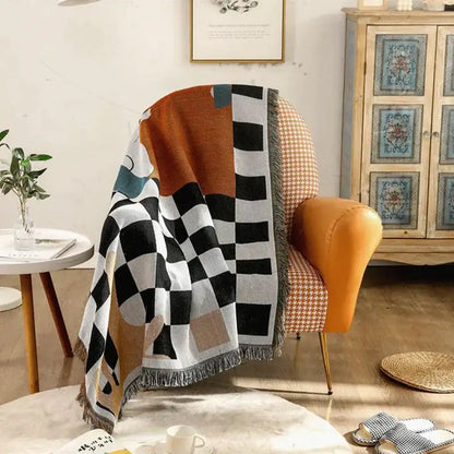 Black and white fox cozy plaid wool blend bedroom throw with bold geometric pattern and fringe detailing decorbites cozy plaid