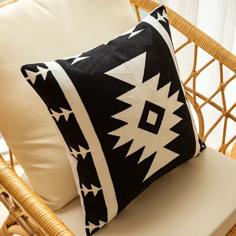 Black and white geometric embroidered cushion cover with bold tribal-inspired design for living room decorbites decor