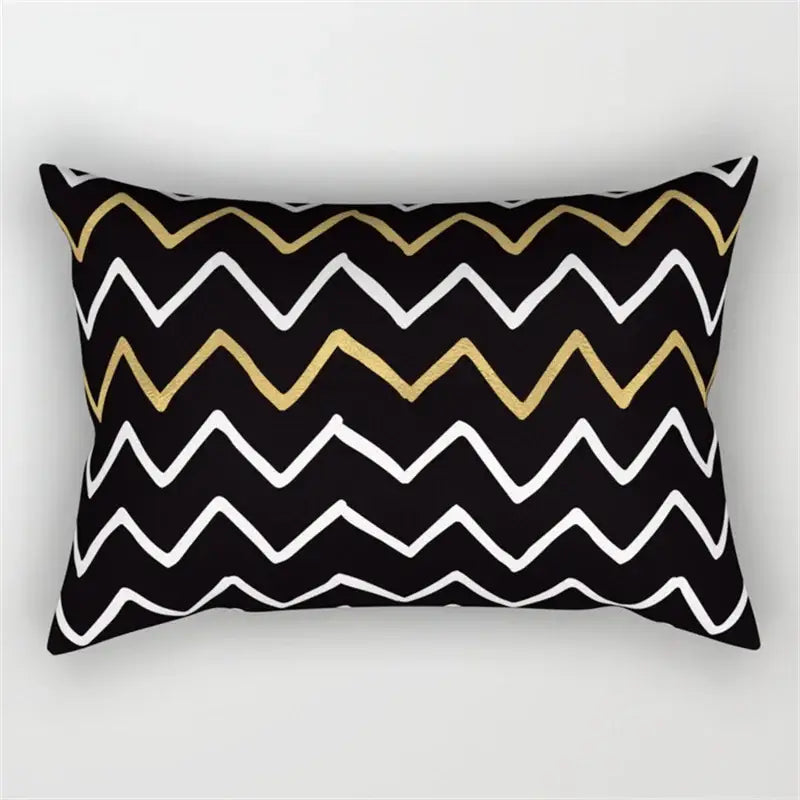 Black rectangular pillow with bold white and metallic gold geometric wave line pattern for bedroom decor