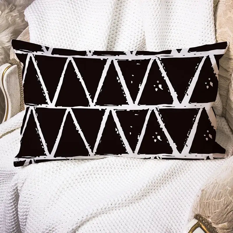 Black rectangular pillow with bold white geometric wave line triangle pattern for bedroom decor
