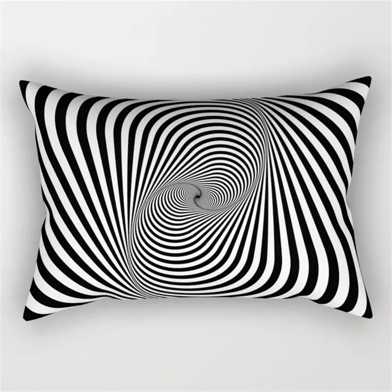 Rectangular black and white pillow with bold geometric wave line spiral stripes for modern bedroom decor