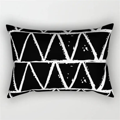 Black rectangular pillow with bold white geometric wave line triangle pattern for bedroom decor
