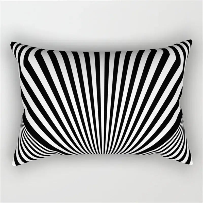 Rectangular pillow with bold black and white geometric wave line stripes creating a striking optical illusion for bedroom decor