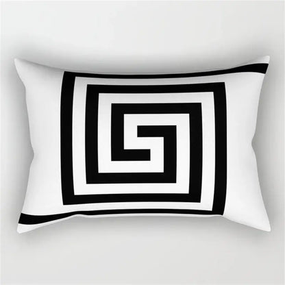 White rectangular pillow with bold black greek key pattern featuring geometric wave line design for bedroom decor