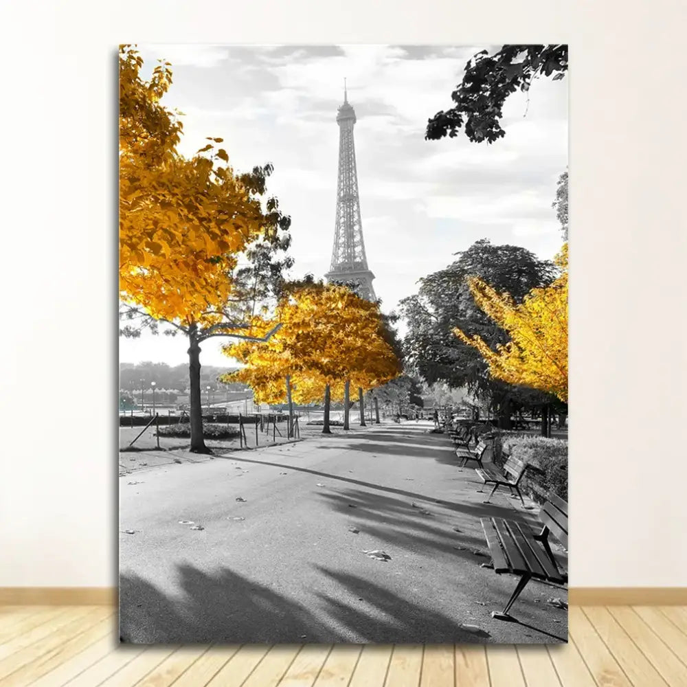 A framed DecorBites™ black and white nordic landscape canvas set featuring the Eiffel Tower and yellow autumn trees