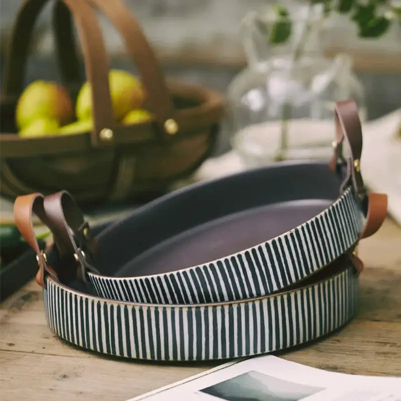 Set of two black and white striped porcelain bowls with leather handle and brass hardware for dining room decorbites porcelain bowl