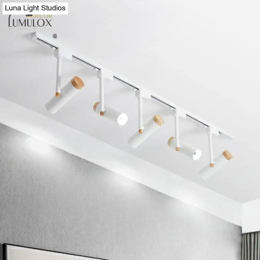 White track lighting system with wooden accents and adjustable spotlights from decorbites nordic tubular metallic spotlight with wood cap