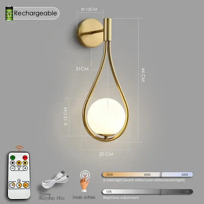 Gold teardrop battery operated wall sconce with spherical light from decorbites™ black collection with usb type-c remote