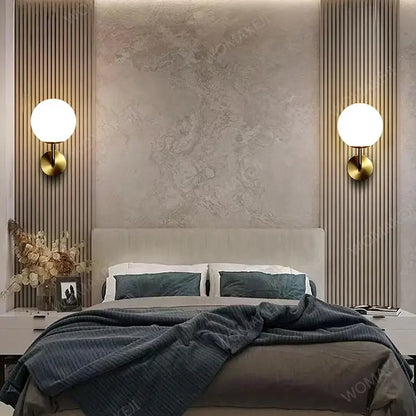 Modern bedroom interior featuring DecorBites™ black battery operated wall sconces with remote and usb type-c charging