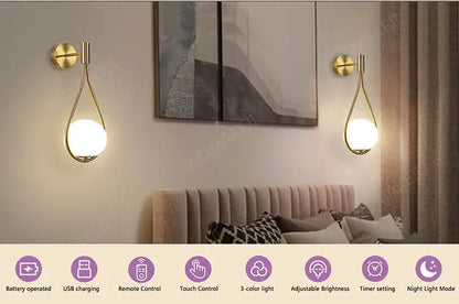 Two gold teardrop battery operated wall sconces with glowing white globes from decorbites usb type-c compatible
