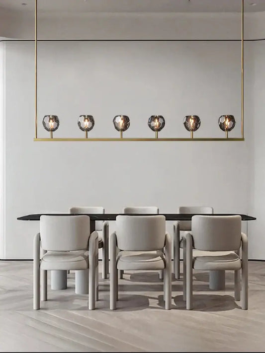 Gold-toned linear pendant chandelier lights with six spherical glass bulbs by decorbites black bronze copper for dining room