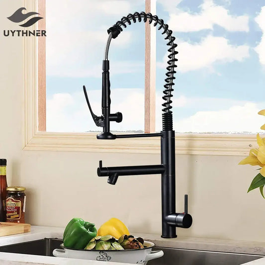 Black bronze kitchen mixer faucet with black matte finish, flexible coiled hose, and pull down spray head