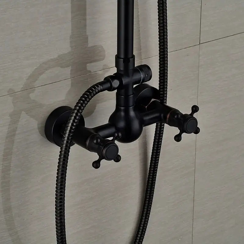 Black bronze shower faucet set with black matte finish, cross handles, and flexible braided hoses for bathroom use