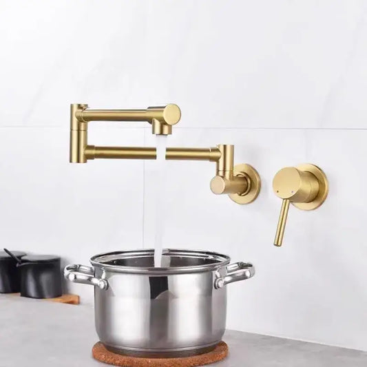 Black brushed gold kitchen pot filler wall mounted dual handle tap with gold-colored sleek articulated faucet design