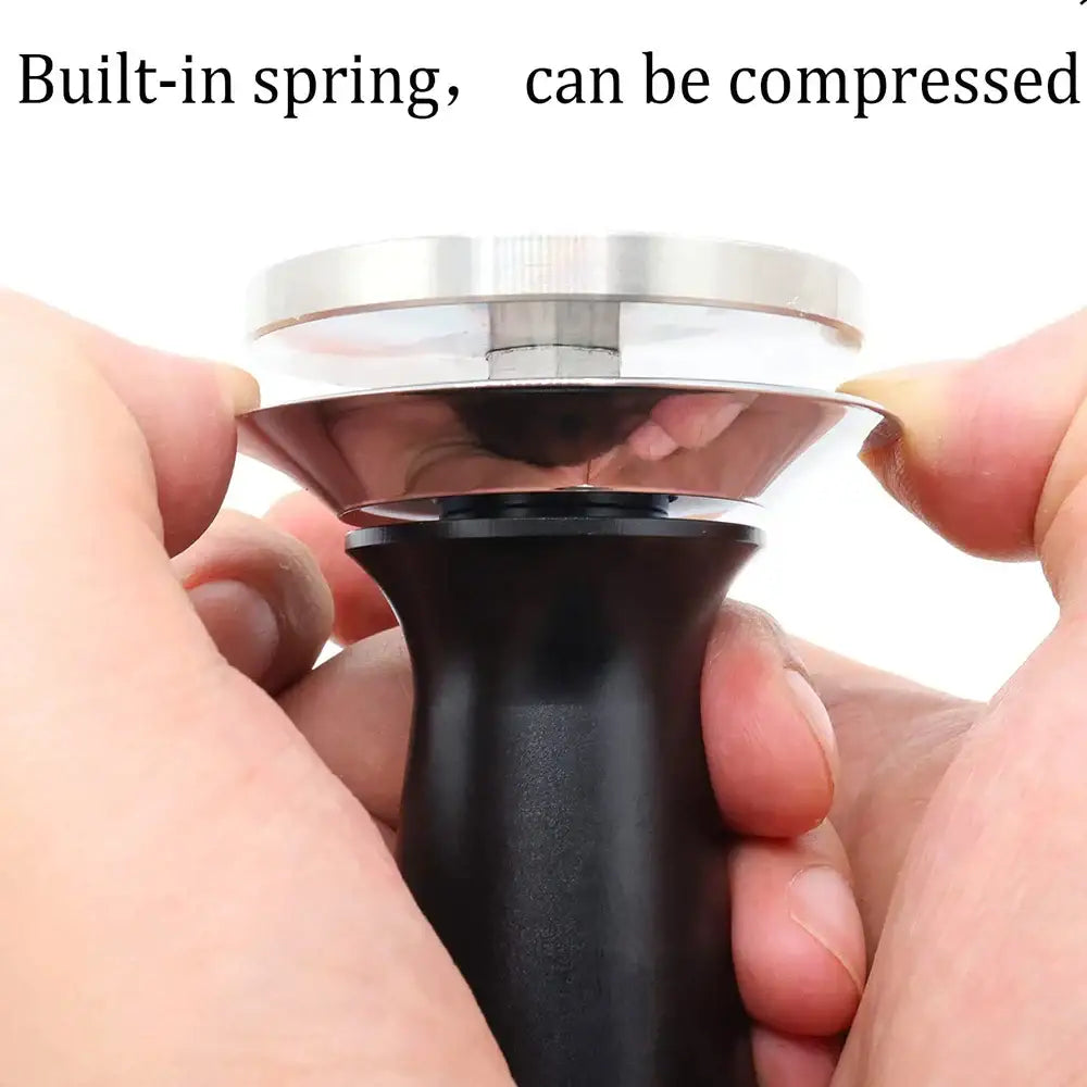Black calibrated espresso coffee tamper with black handle polished stainless steel top and built-in spring mechanism