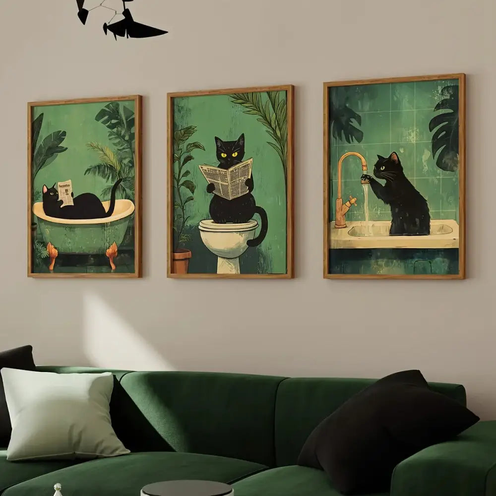 Set of three framed black cat wall art prints with vintage green backgrounds in wooden frames for black cat bathroom decor
