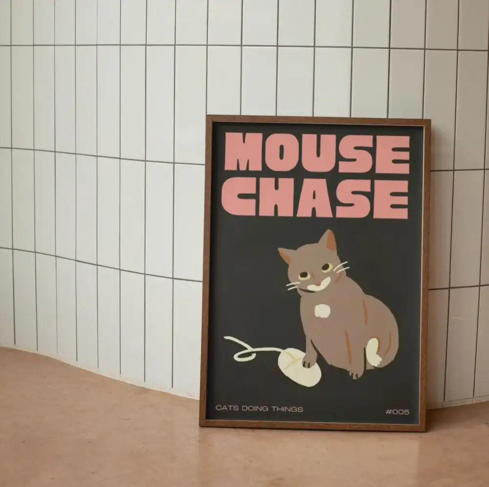 A framed wall art canvas featuring a gray and white cartoon cat and mouse yarn in black cat funny animal style