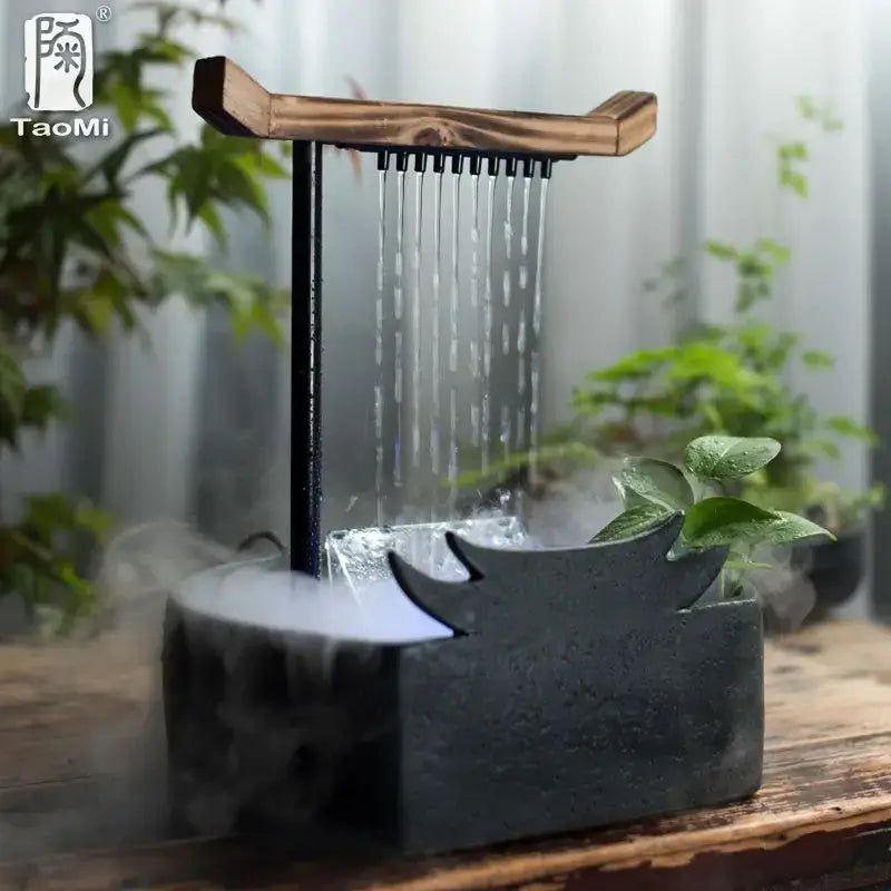 Black ceramic water fountain with wood roof and black metal spout emitting mist for living room decorbites ceramic water fountain