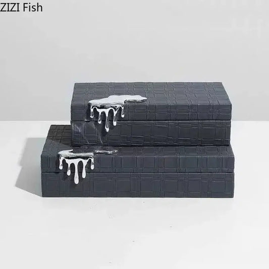 Black crocodile leather jewelry box with textured pattern and silver metallic drips designed by zizi fish