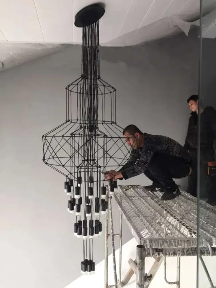 Black geometric designer nordic ceiling chandelier with cascading cylindrical light fixtures for living room decorbites designer nordic