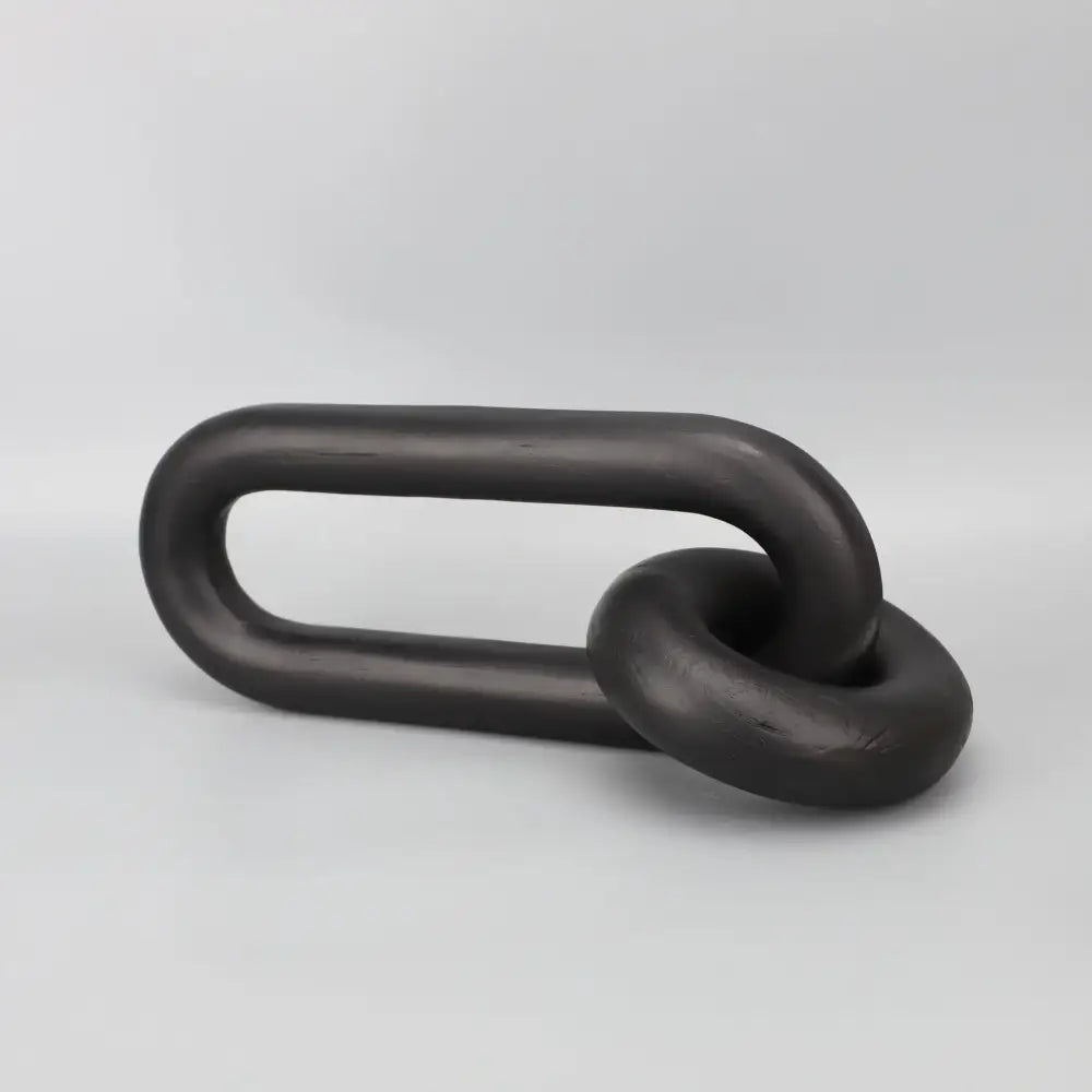 Black geometric resin ornament chain link sculpture with black matte finish for modern living room decorbites decor