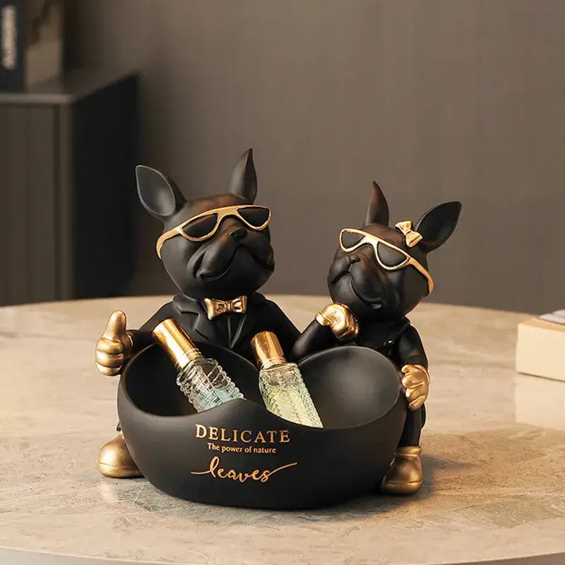 Black and gold french bulldog butler statue in tuxedos holding bowl with perfume bottles for office desk organizer