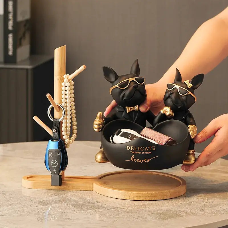 Black and gold french bulldog butler statue holding a heart-shaped bowl engraved for office desk organizing