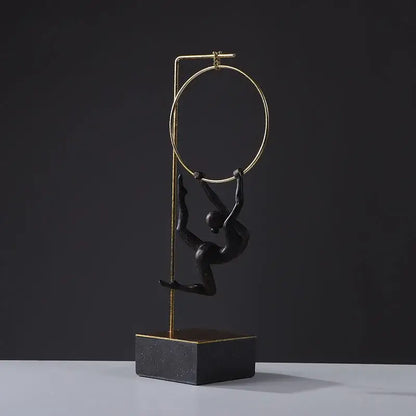 Black and gold gymnastic acrobat resin sculpture on adjustable metal pole with matte black base for decorbites gymnastic acrobat decor