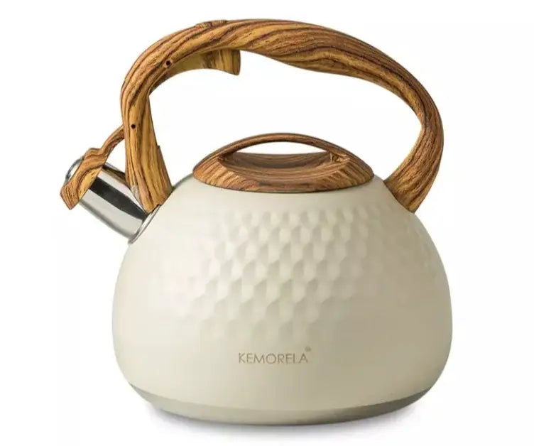 Cream-colored hammered stainless steel whistle boiling kettle with natural wood handle and kemorela brand name