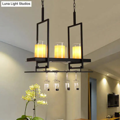 DecorBites black metal island light fixture with three amber candle-style lights and integrated clear glass cylindrical holders