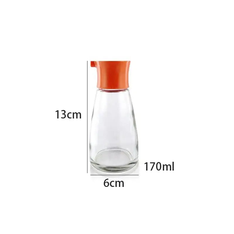Clear glass 170ml seasoning bottle with vibrant orange spout and lid for easy dispensing in black and lime green set
