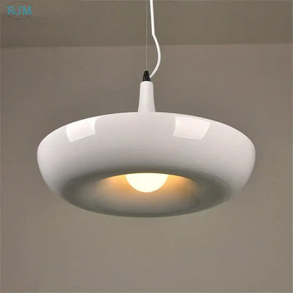 White ceramic pendant light with warm glow complements black matte babylon garden pot plants pendant light kitchen decor