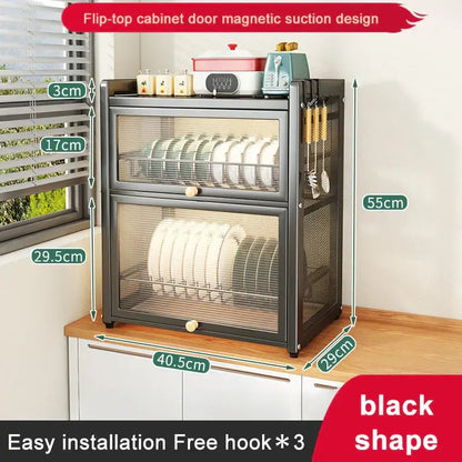 Black metal double layer dish drying rack with flip-top cabinet door, magnetic suction, and mesh sides for kitchen storage