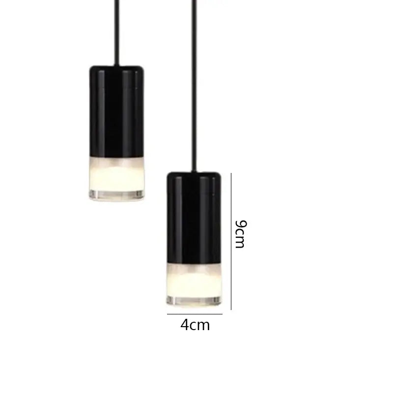 Black minimalist led wall lamp featuring black cylindrical pendant lights with frosted glass bases for bedroom decorbites