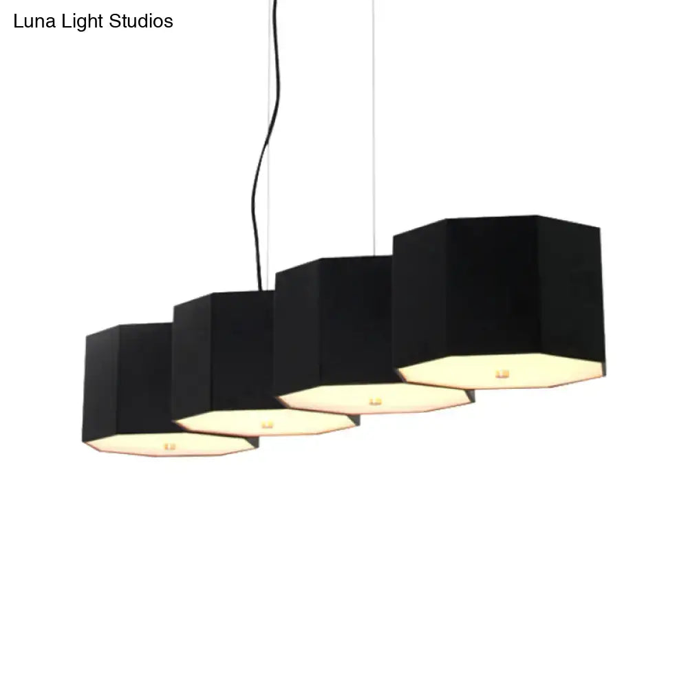 Black hexagonal DecorBites™ Nordic island light with octagon metal shade and warm glow for dining room illumination