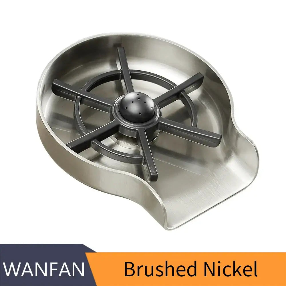 Brushed nickel kitchen sink drain catcher with black perforated sphere and arms for glass rinser cup washer in home kitchen