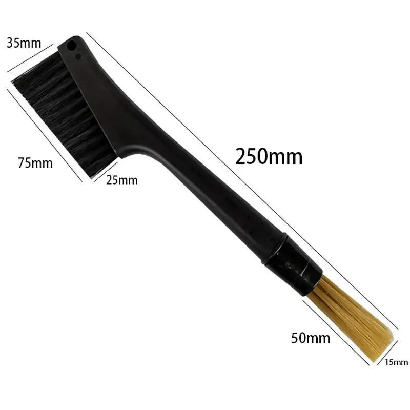 Black plastic espresso machine cleaning brush with dual-sided dense black and soft tan bristles by decorbites
