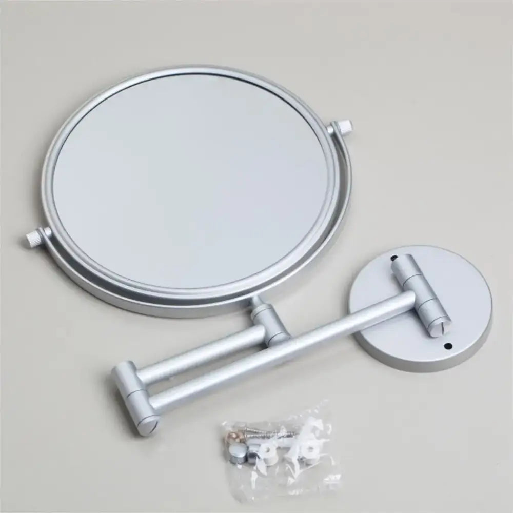 Silver-finished double-sided magnifying wall mounted mirror with sleek articulated arm for decorbites 3x magnifying use