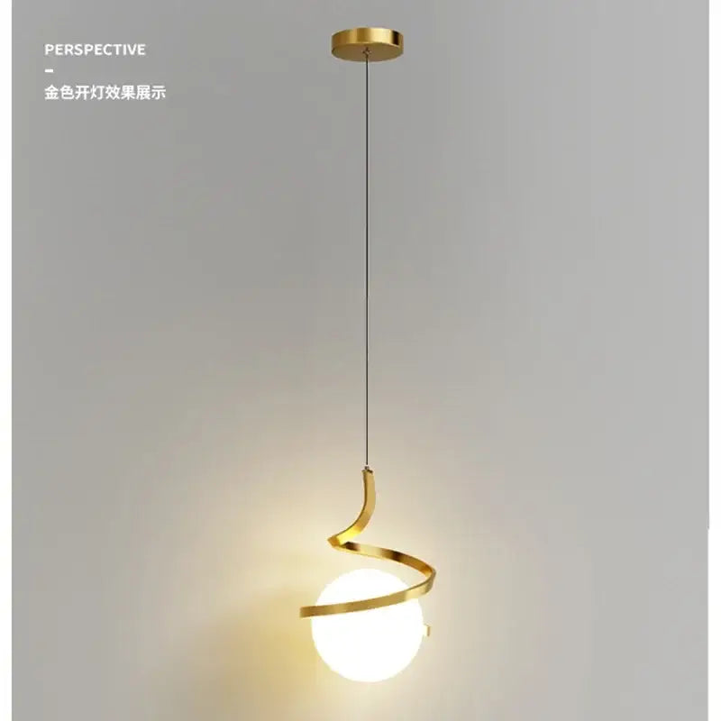 Gold spiral pendant light with frosted glass globe and black spiral cord pendant installation for dining room use