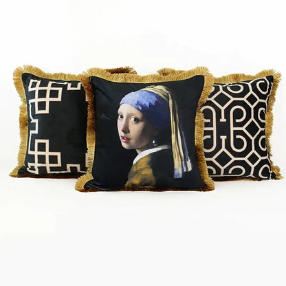 Black pillow cover with girl with pearl earring portrait and gold fringe decorbites geometric fringed lumbar design