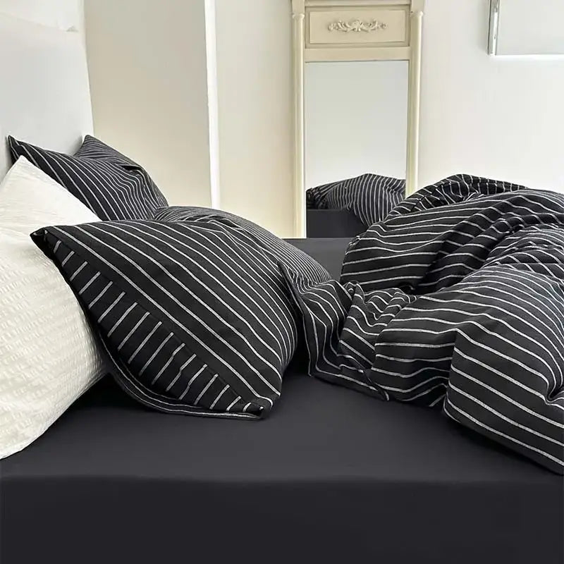 Black and white striped cotton duvet cover set featuring a textured woven fabric finish for bedroom bedding
